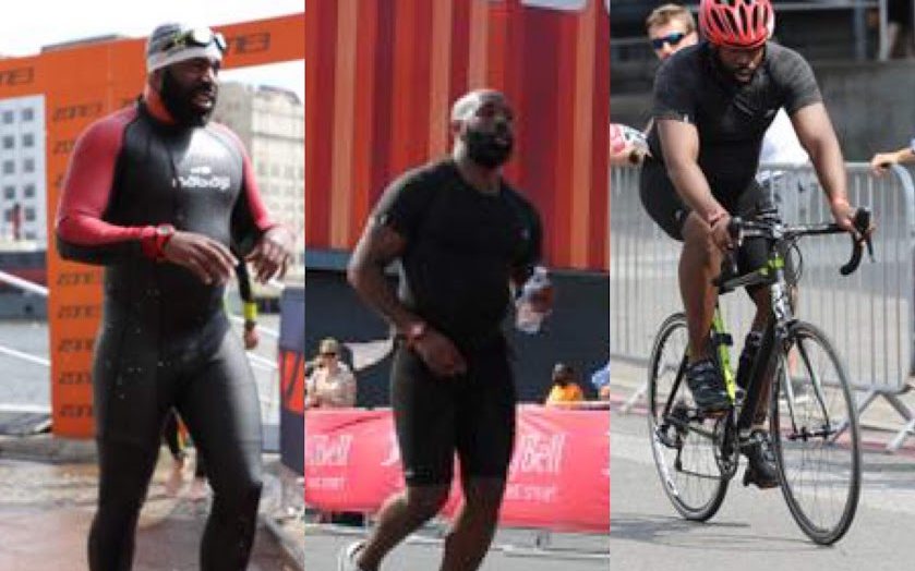 Founder Kenny Akpan swimming, running and cycling at a London triathlon
